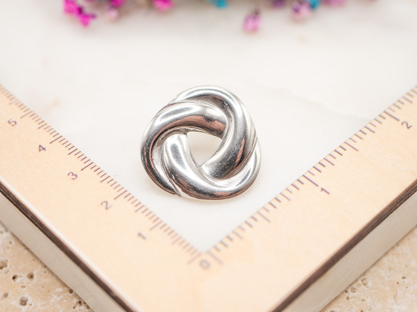 Boucles d'oreilles Nœud Chromé