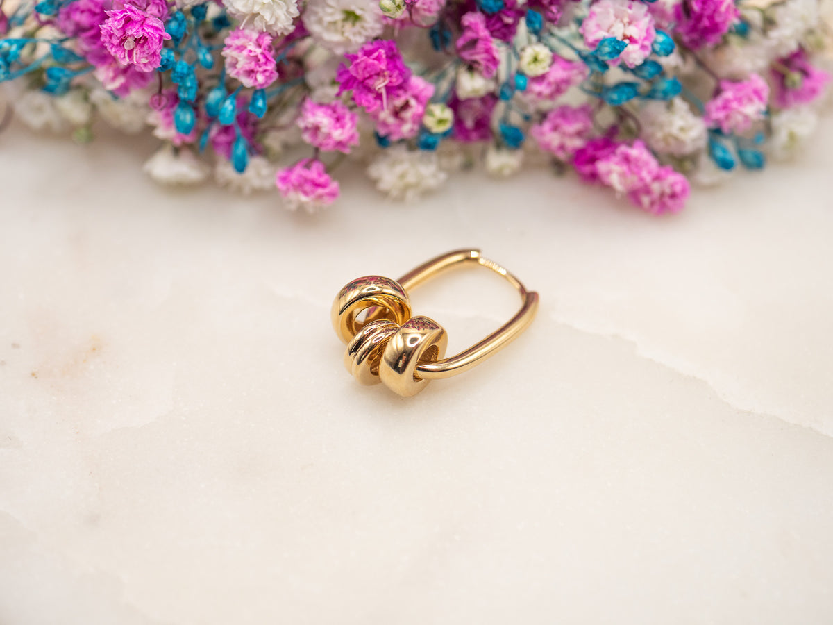 Boucle d'oreille unique Étreinte Virena