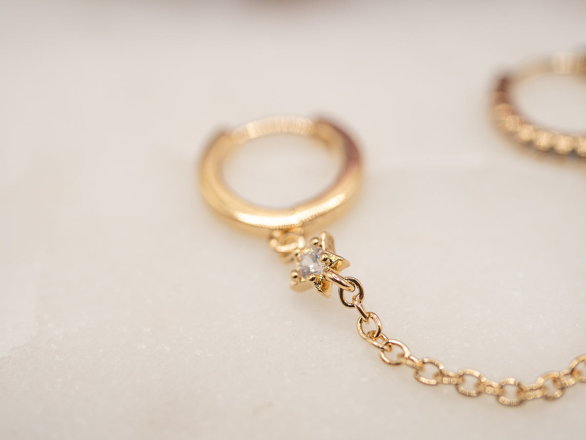 Boucle d'oreille unique Lien Nuvéa