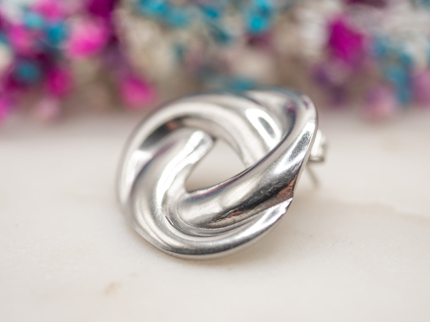 Boucles d'oreilles Nœud Chromé
