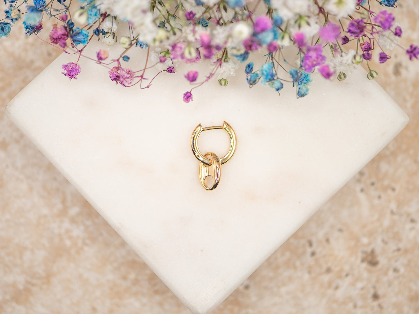 Boucle d'oreille unique Windsor knot