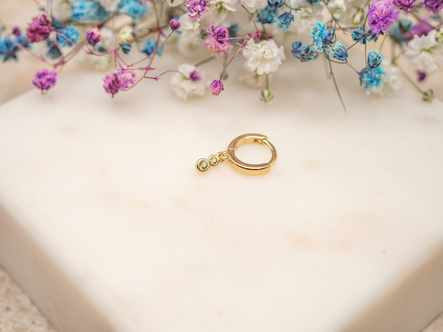 Boucle d'oreille unique Glow