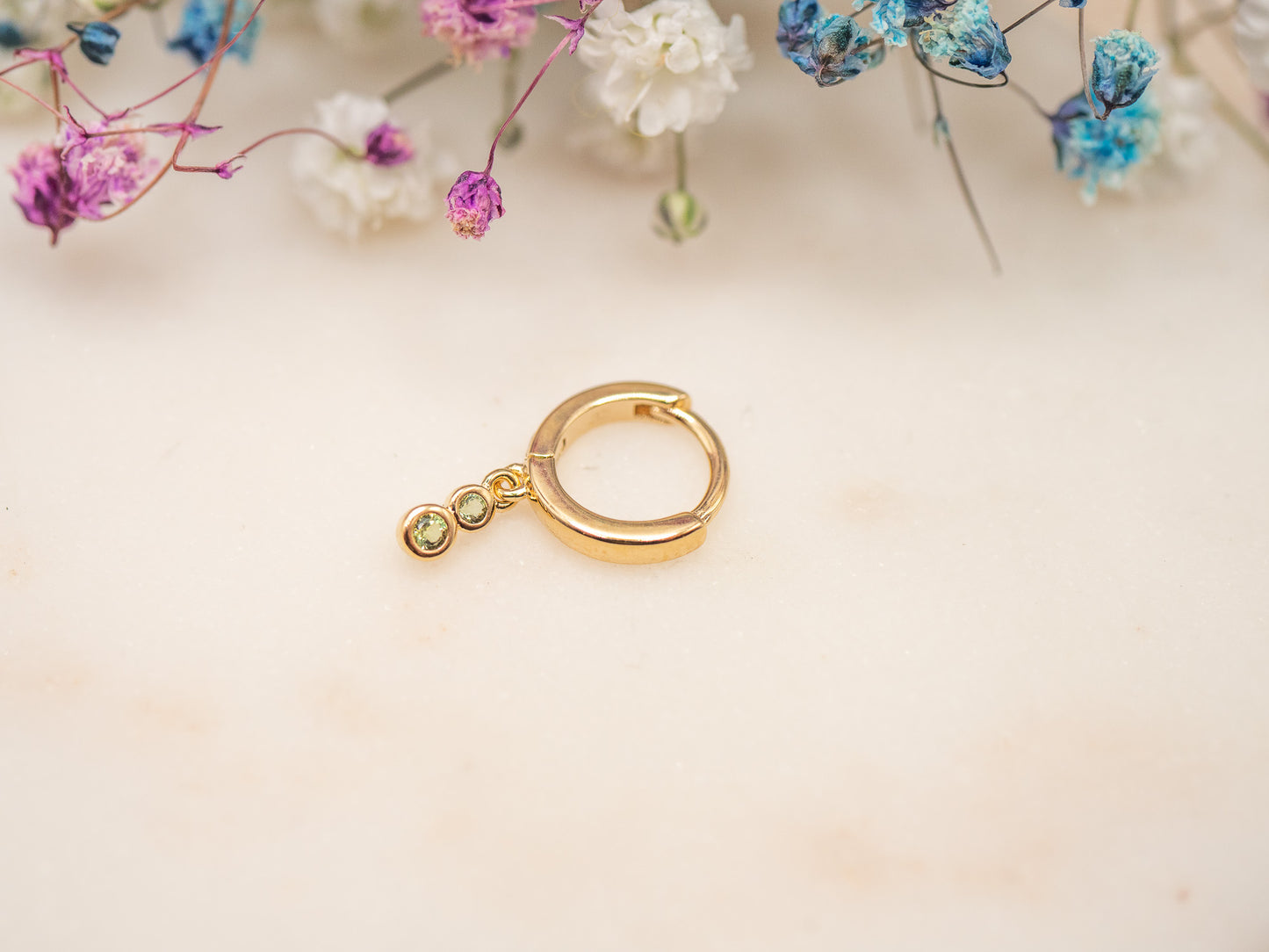 Boucle d'oreille unique Glow