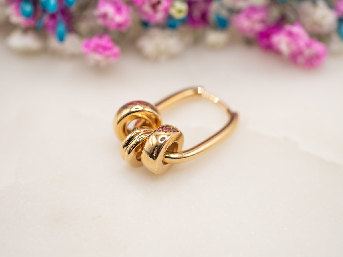 Boucle d'oreille unique Étreinte Virena